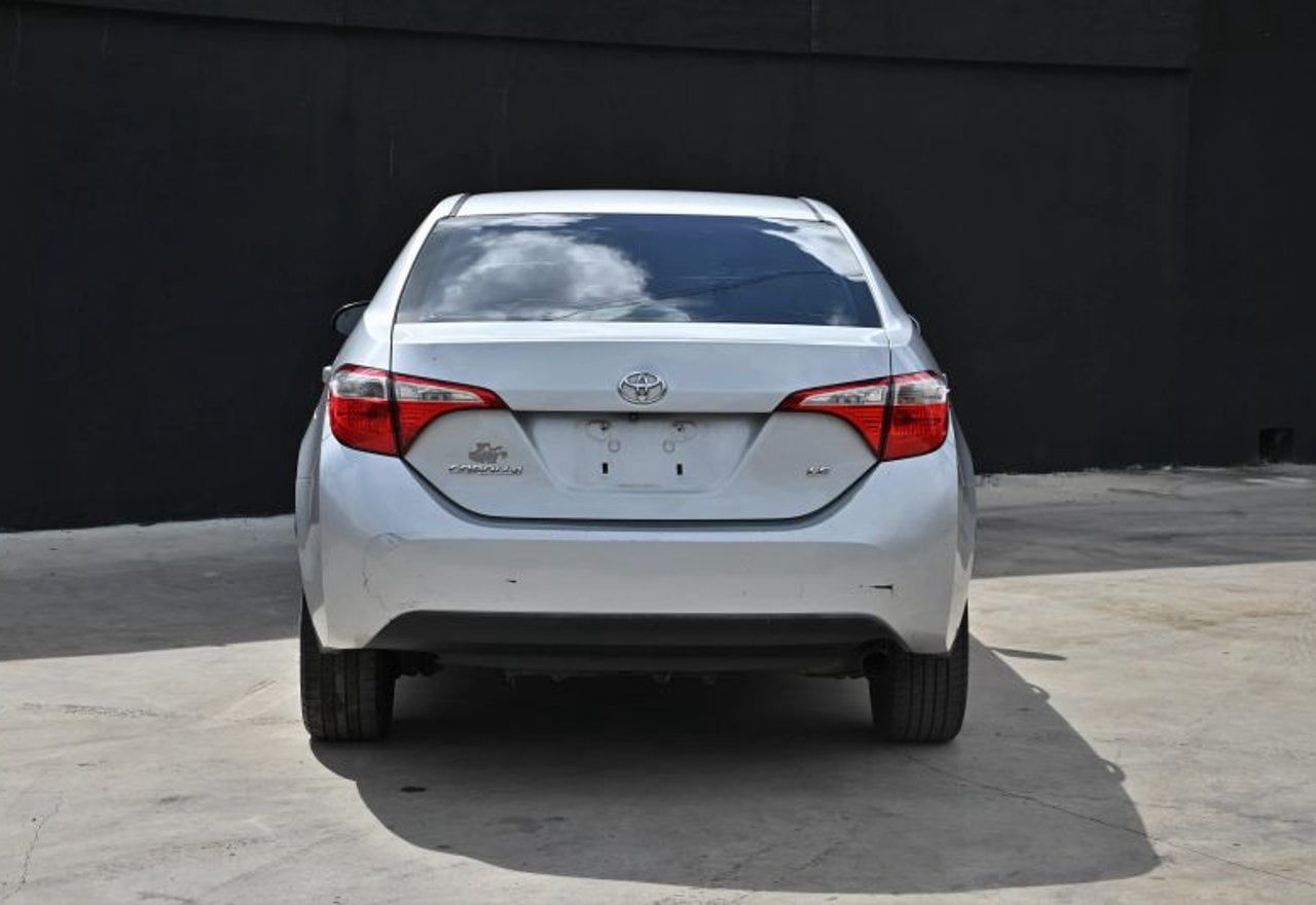 2015 Toyota Corolla LE Sedan 4D - 2T1BURHE8FC466517 photo 25
