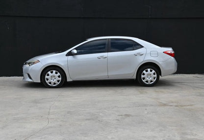 2015 Toyota Corolla LE Sedan 4D - 2T1BURHE8FC466517 photo 7
