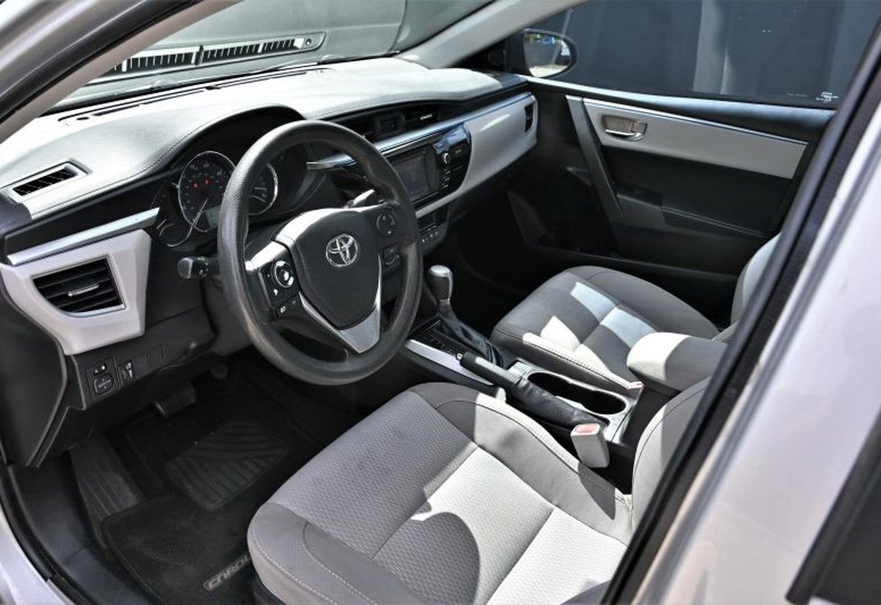 2015 Toyota Corolla LE Sedan 4D - 2T1BURHE8FC466517 photo 33